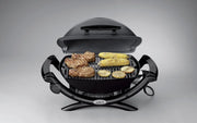 Weber Q1400 Elektryczny Grill, powierzchnia grillowania 43 x 32 cm, przenośny BBQ Grill,2-częściowy żeliwny ruszt pokryty emalią porcelanową, pokrywa i obudowa aluminiowa - Ciemnoszary (52020079)